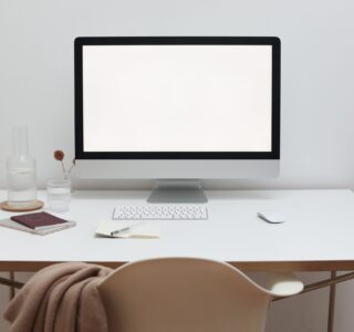 Free Stylish workspace with computer and simple furniture Stock Photo