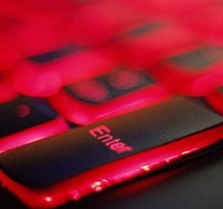 a close up of a red and black keyboard