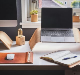 Free A stylish and contemporary home office setup with laptop and desk accessories. Stock Photo